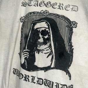 Staggered Worldwide shirt, stained